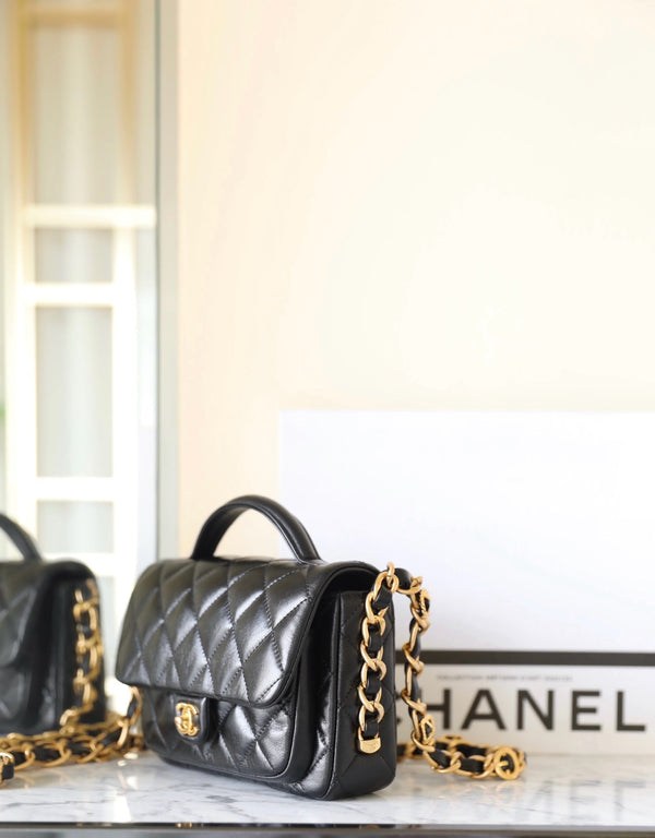 cc 24a flap bag 20cm top handle black lambskin gold hardware