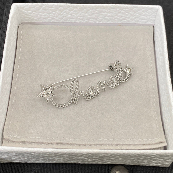 Chanel Star & Script Logo Brooch