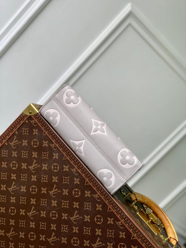 LV OnTheGo East West Bag Gray White Monogram Empreinte leather 240824