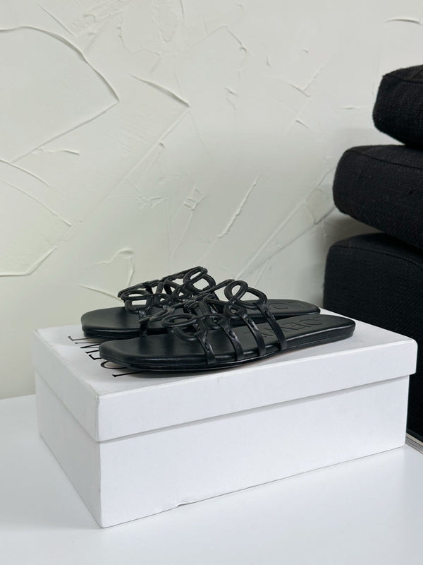 Petal Anagram Slide in Black Soft Calfskin 273512