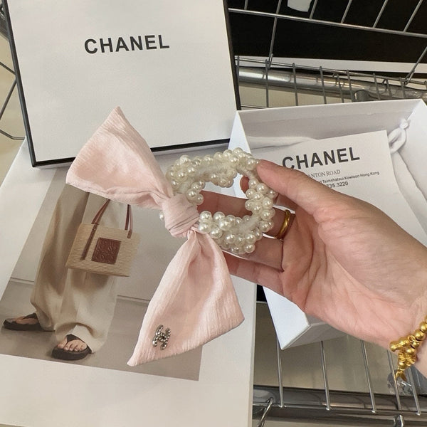 LIGHT PINK WRINKLED FABRIC WITH PEARL SCRUNCHIE 358300