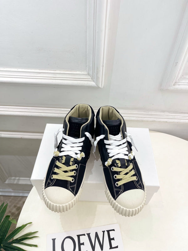MM 26s New Evolution Mid-Top Sneakers Black Canvas Calfskin 947481
