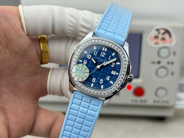 Patek Aquanaut 35.6mm Navy Blue Dial Blue Rubber Strap