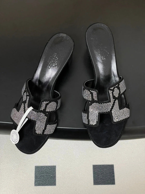 HM 25S ORAN HIGH‑HEEL SANDAL 50 MM IN BLACK LAMBSKIN WITH WHITE STONE DETAILS