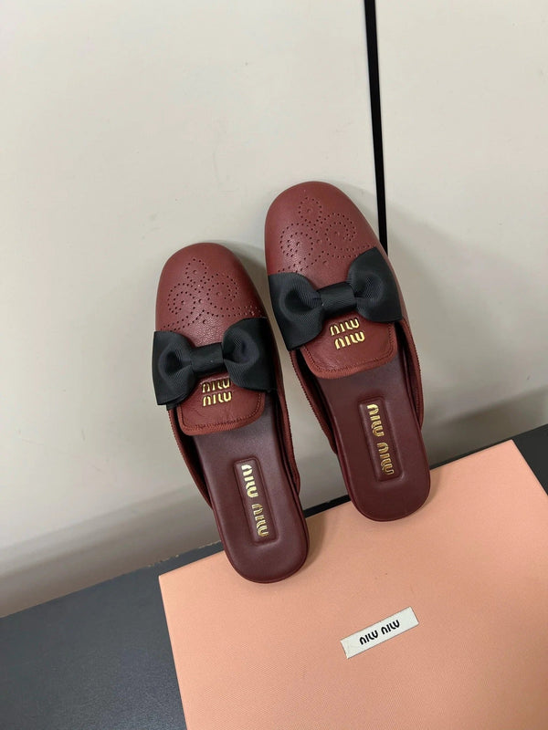 BOW MULES IN RED BROWN SHEEPSKIN
