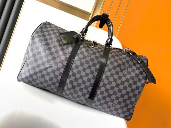 KEEPALL BANDOULIÈRE 45 IN BLACK DAMIER GRAPHITE CANVAS