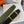 H TUBE BELT 38MM GOLD BUCKLE GREEN BLACK LEATHER