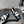 CC 25S Round Toe Chain Loafers in Black and White Cowhide 442533