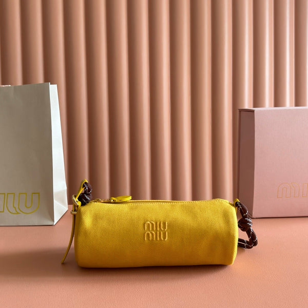 Miu Miu Adventure Nappa Canvas Bucket Bag 22 Yellow in Fabric 285323