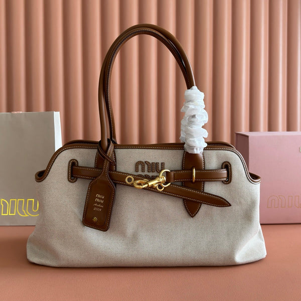 Miu Miu Aventure Handbag 44 Beige in Canvas 285306