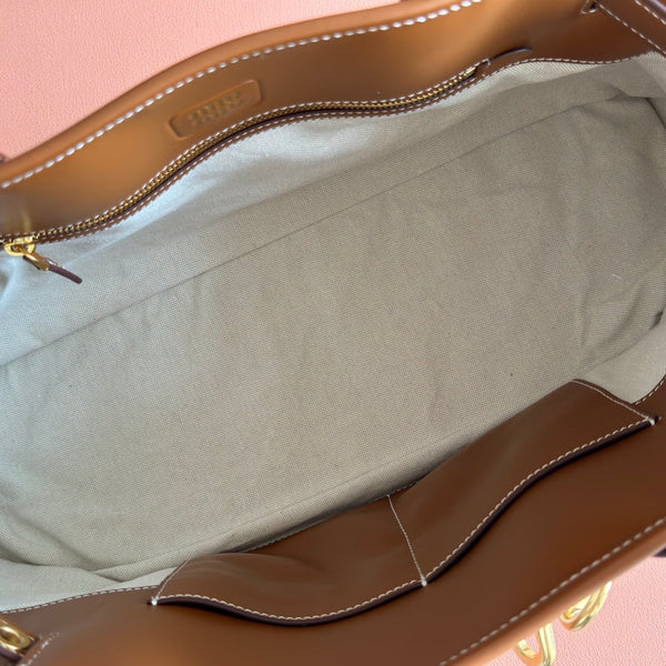 Miu Miu Aventure Handbag 44 Beige in Canvas 285306