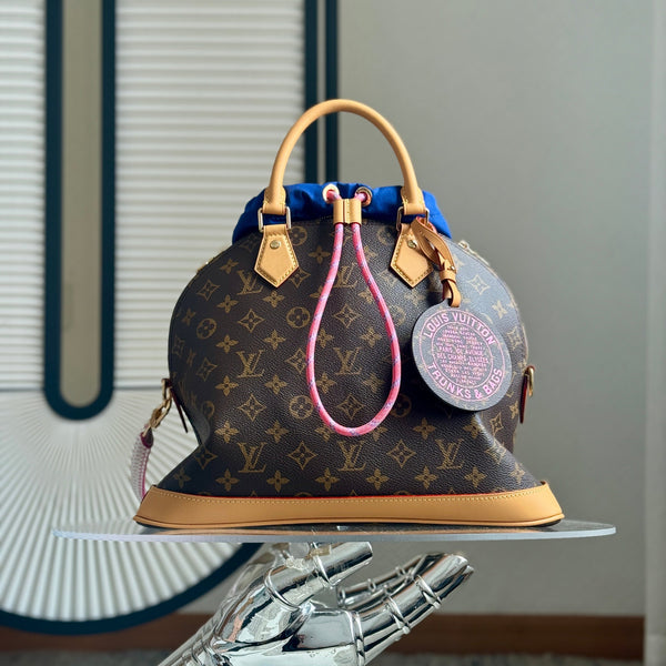 Louis Vuitton Alma Handbag 37 Brown in Canvas Cowhide