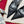 SLINGBACK PUMPS IN BLACK SILK AND SHEEPSKIN LINING WITH TRIANGLE LOGO