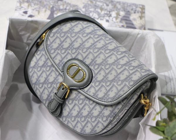 MEDIUM CD BOBBY 22CM GREY OBLIQUE CANVAS GOLD HARDWARE