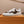 LV TRAINER IN WHITE MIX CHOCOLATE BROWN CALFSKIN