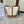 BUCKET 33 IN WHITE TRIOMPHE CANVAS AND BRONZE BROWN CALFSKIN TRIM