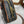 TOP HANDLE BAG 20 IN BLACK TRIOMPHE CANVAS AND BROWN CALFSKIN