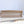 MEDIUM TOTE BOOK 26 BAG IN BEIGE CREAM CALFSKIN