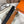 LUCK BELT BUCKLE & REVERSIBLE GINGER ORANGE AND BLACK LEATHER STRAP 38MM SILVER HARDWARE