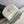 teen besace triomphe 18.5 white calfskin with chain