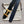 HM BELT BUCKLE & REVERSIBLE BLACK LEATHER STRAP 38MM GOLD HARDWARE