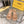 FENDI BAGUETTE SLIDES WOMEN IN DESERT SAND CALFSKIN