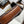 TEEN TRIOMPHE 18.5 TAN MONOGRAM CANVAS BROWN CALFSKIN