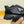 PRA SNEAKER IN BLACK CALFSKIN AND GREY SUEDE