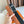 HM TUBE H BELT BUCKLE & REVERSIBLE BLACK AND YAM ORANGE LEATHER STRAP 38MM SILVER HARDWARE