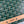 MONTE-CARLO PM CLUTCH 25 IN GREEN GOYARDINE CANVAS