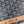 MONTE-CARLO PM CLUTCH 25 IN GRAY GOYARDINE CANVAS