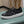 LV TRAINERS IN BLACK CALFSKIN AND MONOGRAM CANVAS