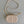 SIGNATURE 18 OVAL BAG IN BEIGE CALFSKIN