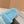 FURRY SLIDES IN SKY BLUE CURLY SHEARLING