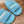 FURRY SLIDES IN SKY BLUE CURLY SHEARLING