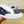 LV TRAINER SHOES BLACK MONOGRAM JACQUARD AND WHITE CALFSKIN