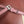 EXTRA POCKET L19 IN FLAMINGO PINK GRAINED CALFSKIN WITH SILVER HARDWARE