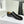 Toy slipper in black goatskin