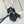 SIDE TRUNK 21 IN BLACK MONOGRAM EMBOSSED CALFSKIN SILVER HARDWARE