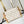 SIDE TRUNK 21 IN WHITE BROWN MONOGRAM CANVAS GOLD HARDWARE