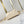 MINI BUMBAG 17 IN CREAM MONOGRAM EMPREINTE LEATHER GOLD HARDWARE