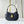 LOW KEY SHOULDER BAG 26 IN BLACK GRAINED CALFSKIN GOLD BUCKLE