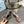 PRA TRIANGLE HEEL FLOWER MOTIF SATIN SANDALS CINNAMON