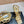 ALAIA THREE-STRAPS HIGH HEEL SANDALS IN GOLDEN PATENT LAMBSKIN