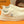 LV TRAINER IN BEIGE CREAM CALFSKIN AND GREY LOGO