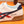 PRA SNEAKER IN WHITE CALFSKIN WITH NAVY BLUE AND RED STRIPED