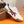 PRA SNEAKER IN WHITE CALFSKIN WITH NAVY BLUE AND RED STRIPED