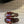 PETAL BELT FLAT SANDAL IN SANGRIA RED CALFSKIN