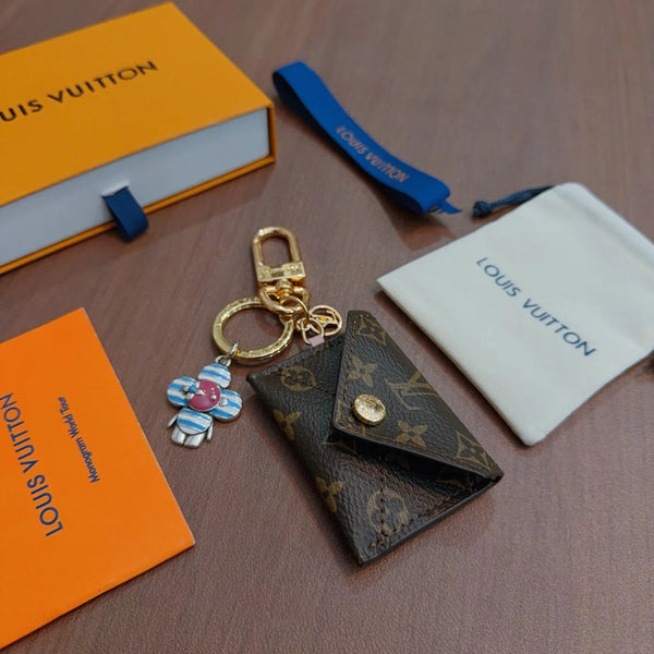 LV Brown Bag Charm With Blue Flower