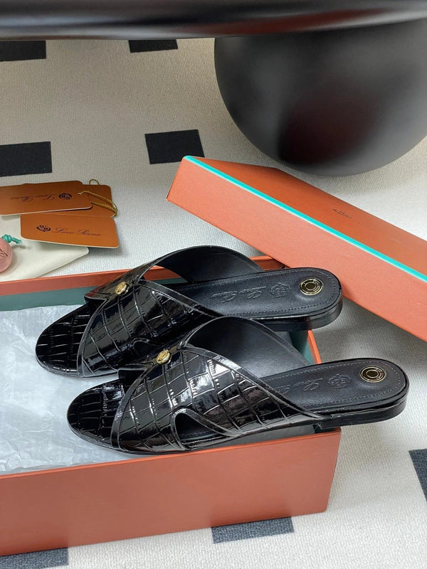 FLAT SLIPPERS IN BLACK CALFSKIN SNAKE EMBOSSING